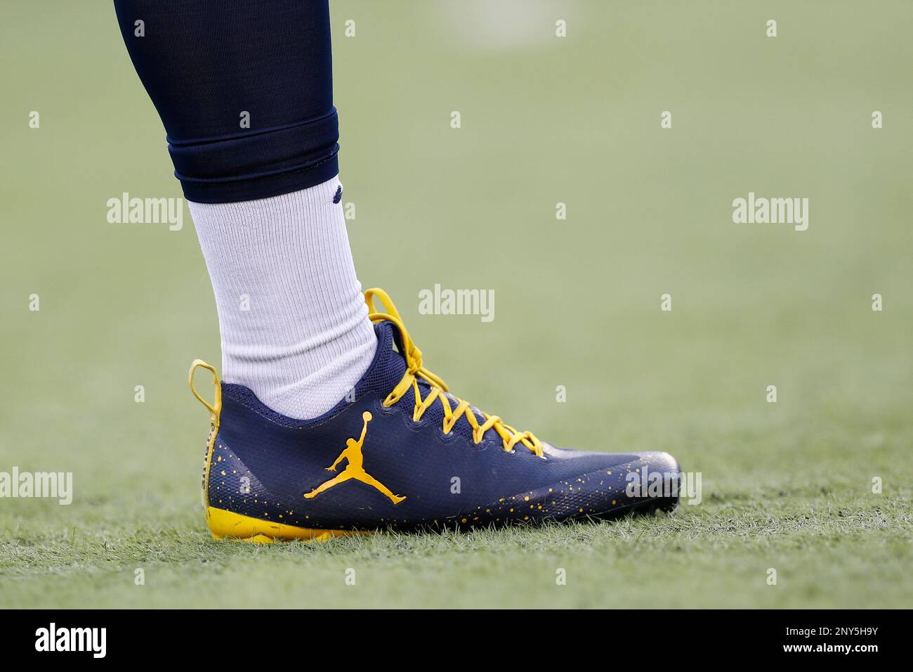 A detail view of Jordan Brand Nike cleats wore by a University of Michigan Wolverines player prior to an NCAA college football game against the Michigan State University Spartans on Saturday Oct