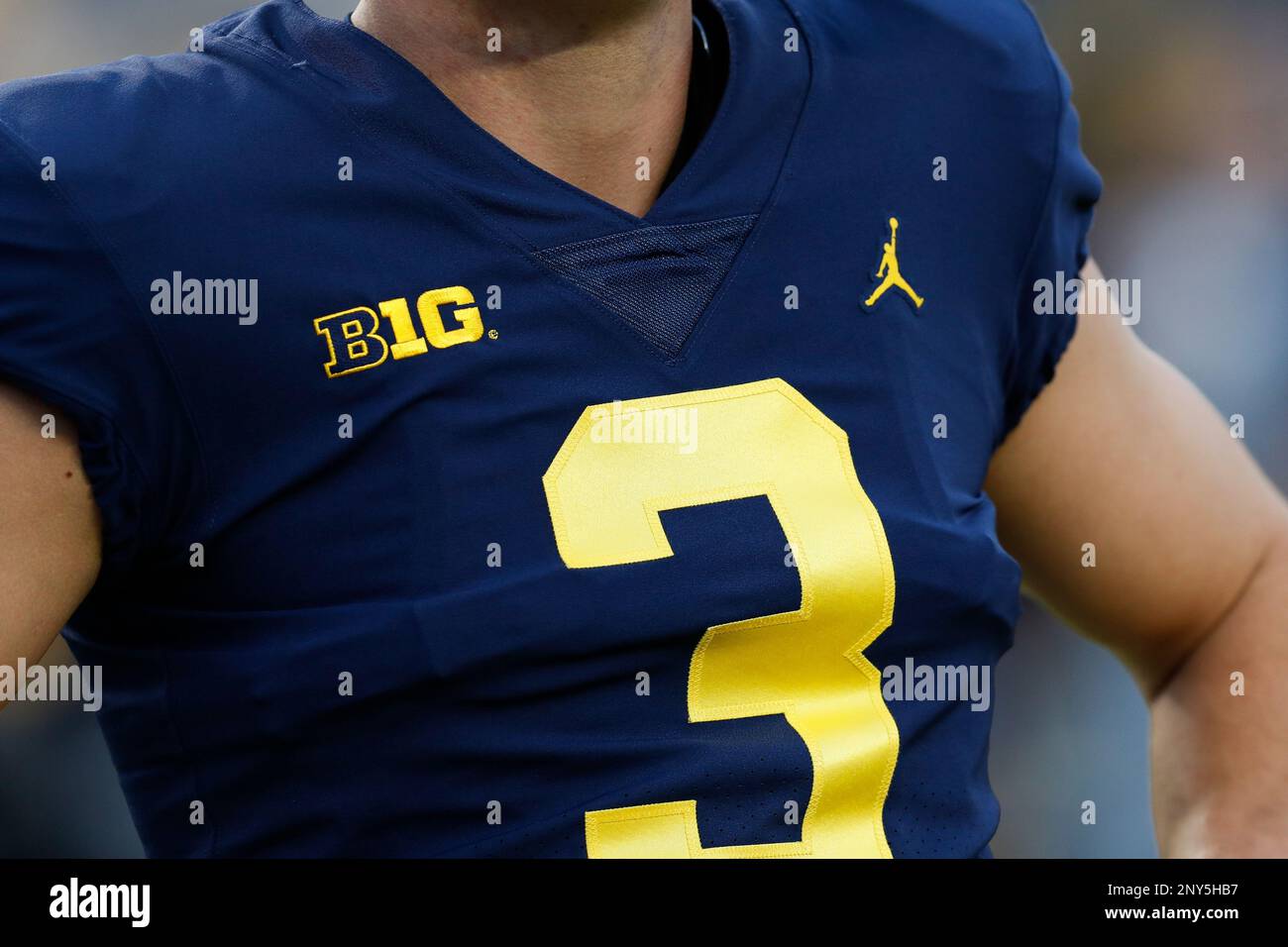 A detail view of the Jordan Brand Nike logo on a University of Michigan  Wolverines jersey prior to an NCAA college football game against the  Michigan State University Spartans on Saturday, Oct.