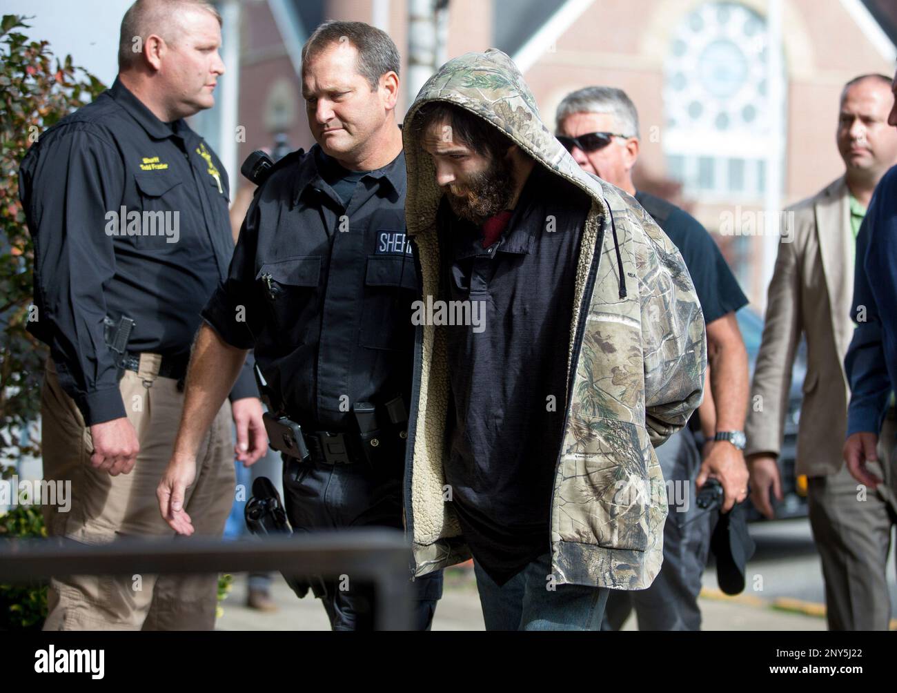 Lawrence County Sheriff Jeff Lawless escorts in Arron Lee Lawson after ...