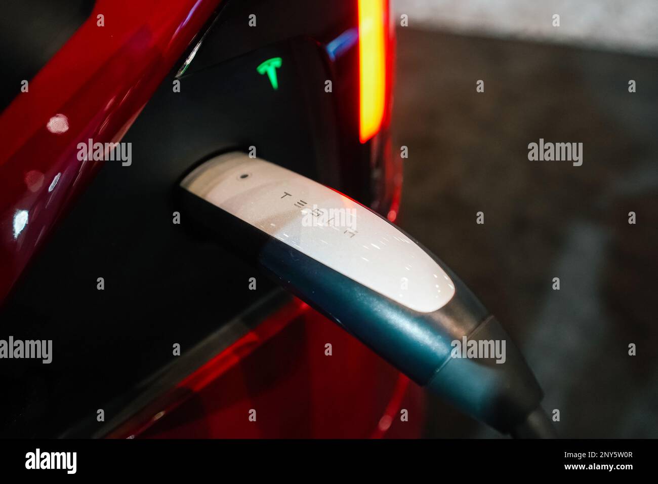 Tesla being charged Stock Photo Alamy