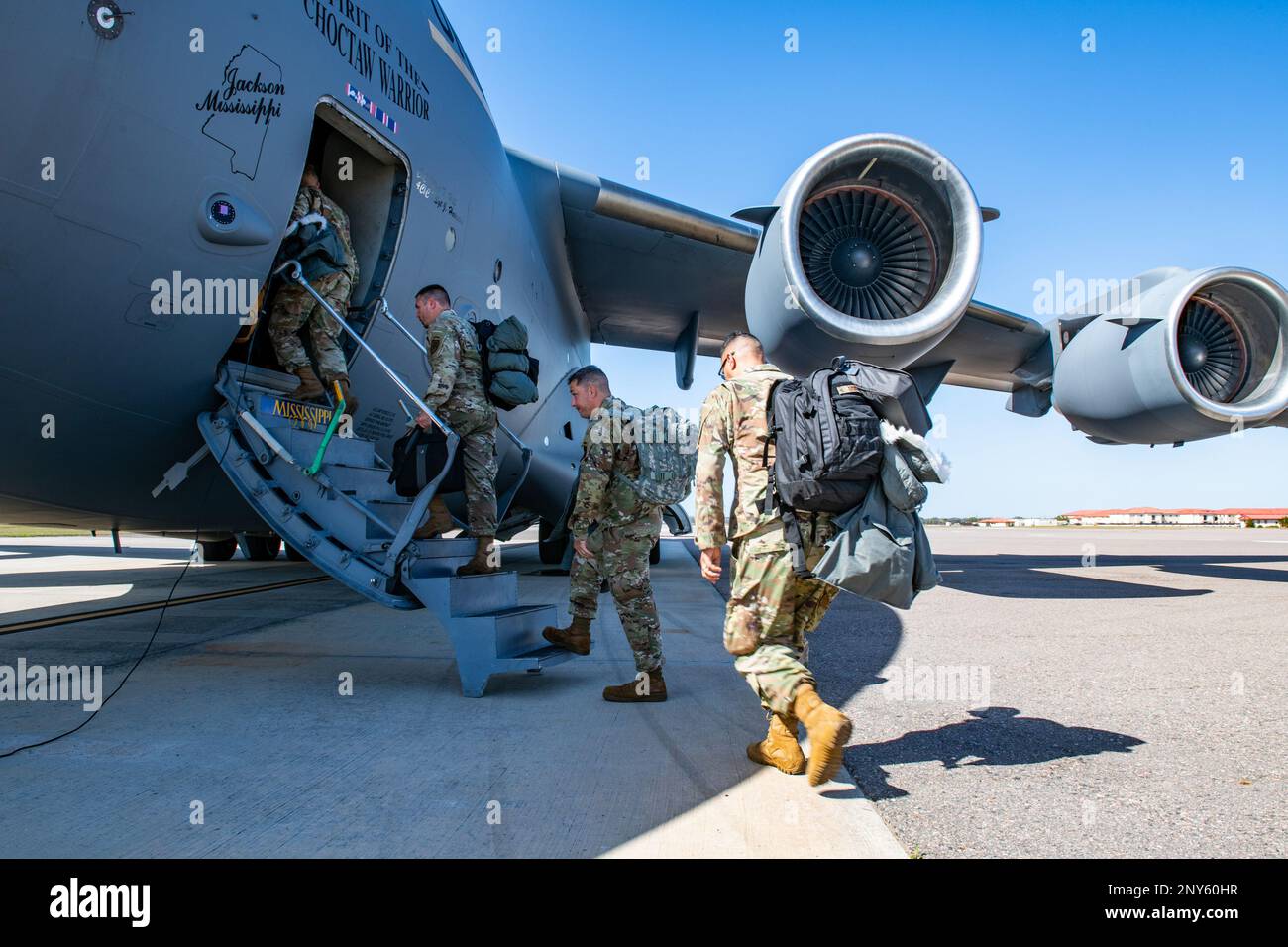 U.S. Airmen from the 290th Joint Communications Support Squadron board ...