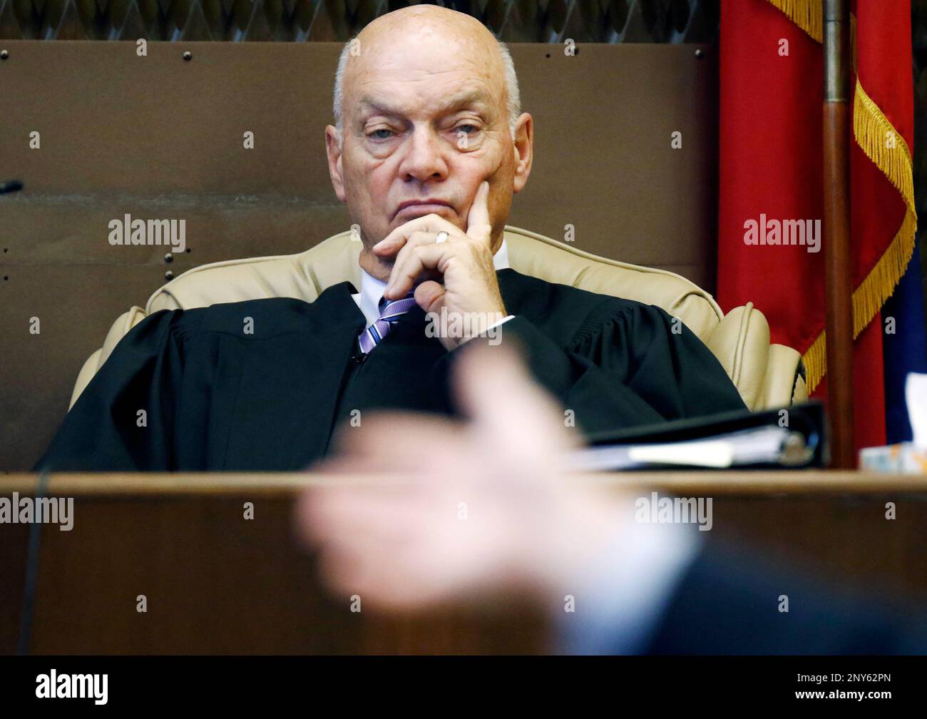Circuit Judge Gerald Chatham listens in his Batesville, Miss
