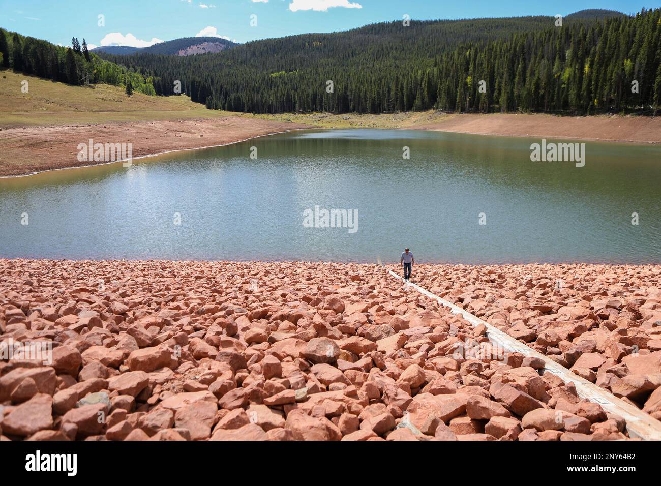 Jeff Shroll, Gypsum Town Manager, checks the water level indicator 