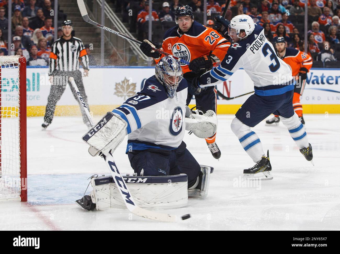 Winnipeg Jets Goalie Connor Hellebuyck (37) Makes The Save As Edmonton ...