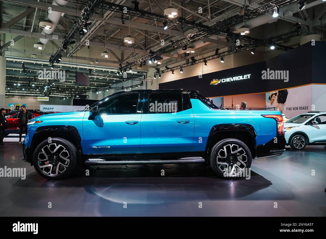 Chevrolet Silverado electric pickup truck in blue, on display at a car show Stock Photo