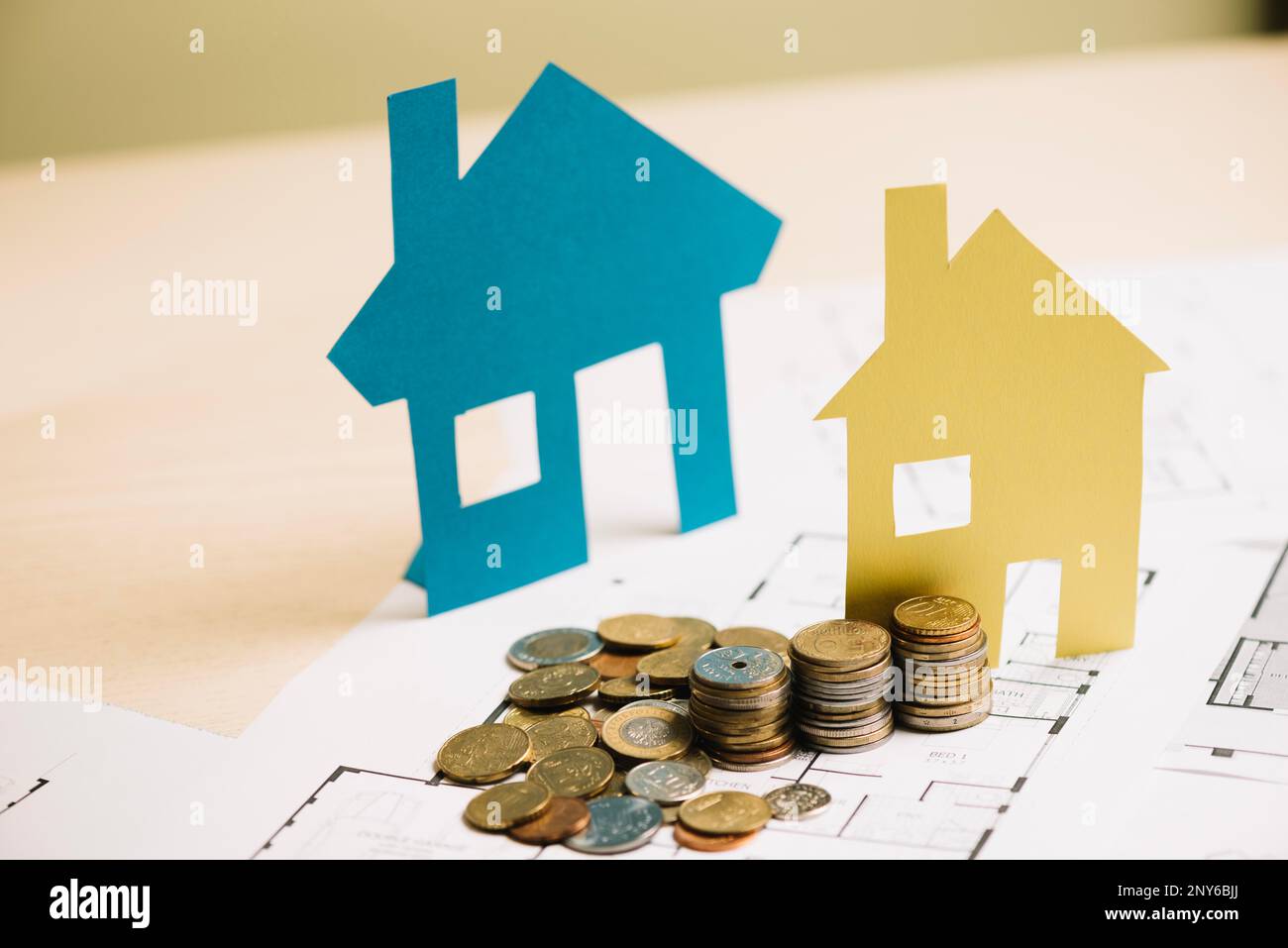stack coins paper houses. High resolution photo Stock Photo