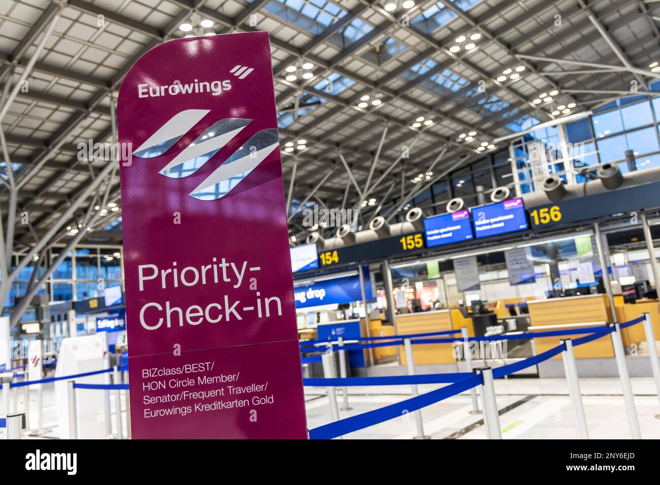 Priority checkin at Stuttgart Airport, terminal with counter of the