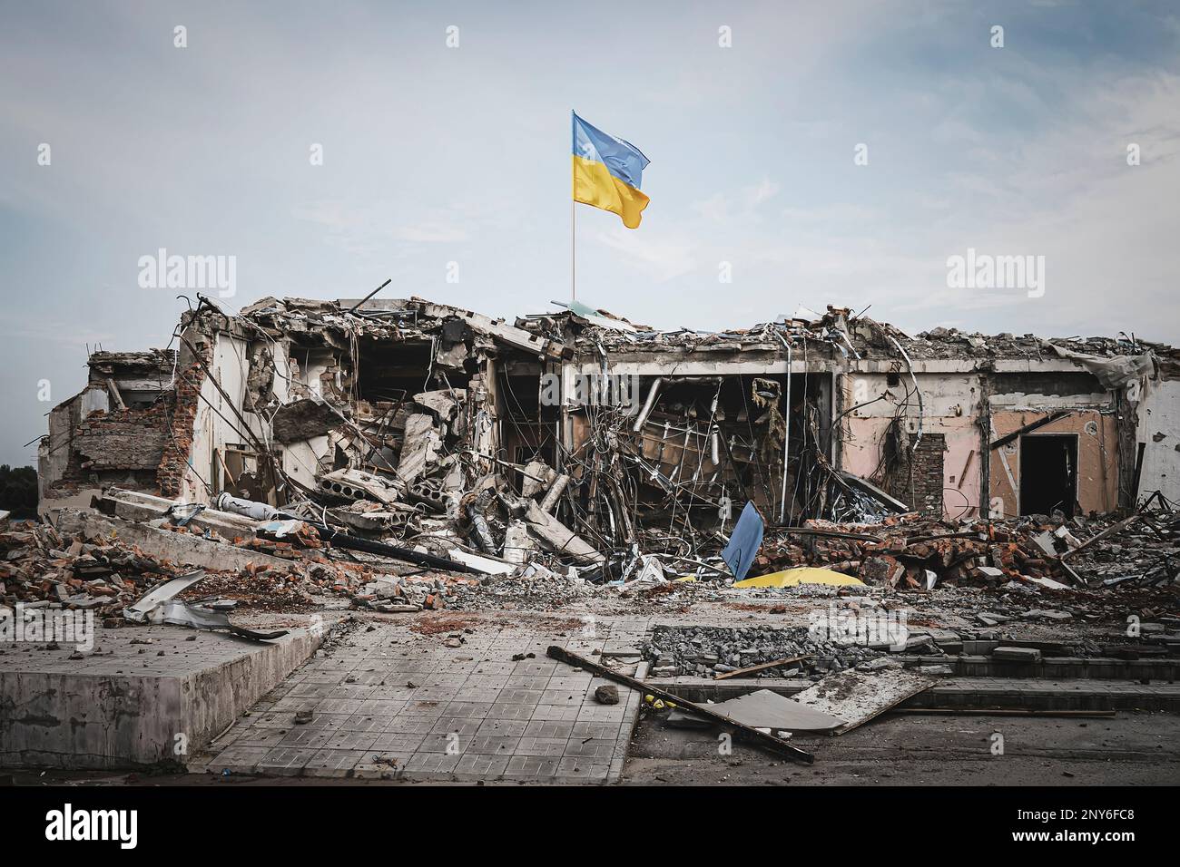 The concept of the aftermath of war. Illustration of the destruction after the war in Ukraine. Consequences of shelling by artillery shells and air st Stock Photo