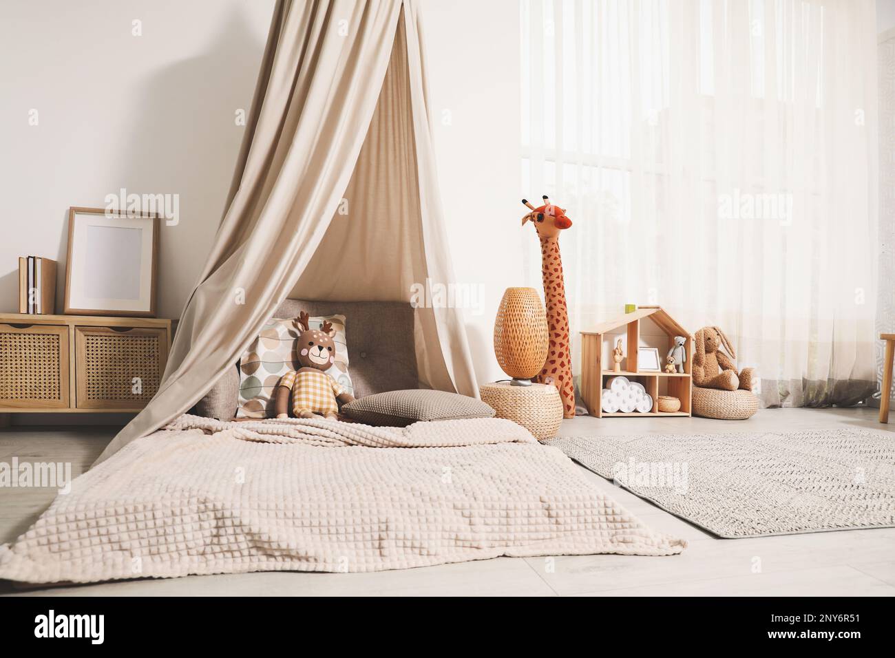 Cozy kids room with play tent, toys and comfortable floor bed ...