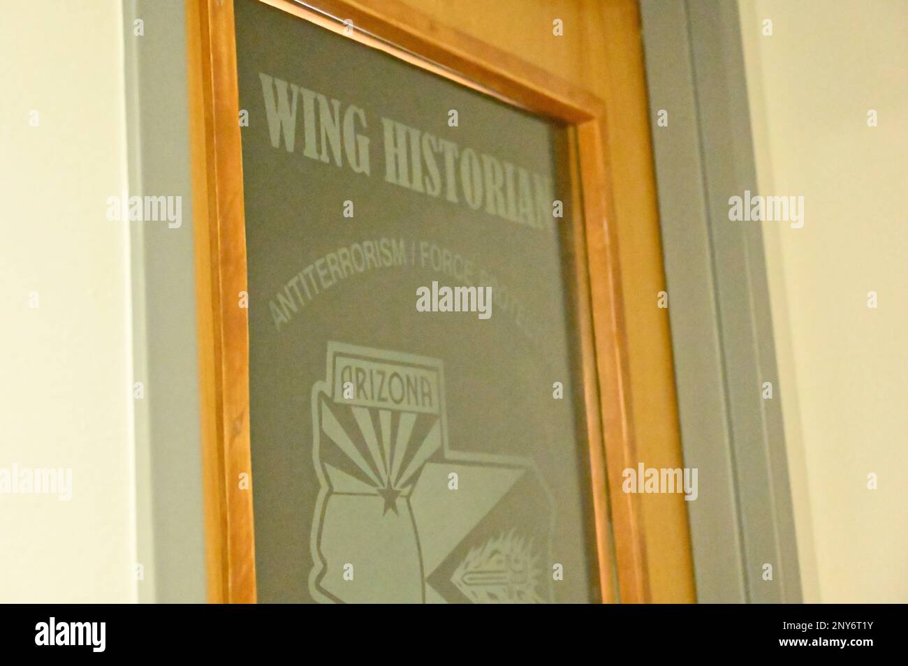Pictured above is a door with a vinyl graphic representing the 355th Wing historian’s office at Davis-Monthan Air Force Base, Arizona, Jan. 24, 2023.  Military historians were established during World War II to accurately record the outcomes of battles and unit history. Modern day historians will also deploy with a unit to document their interactions in real-time. Stock Photo