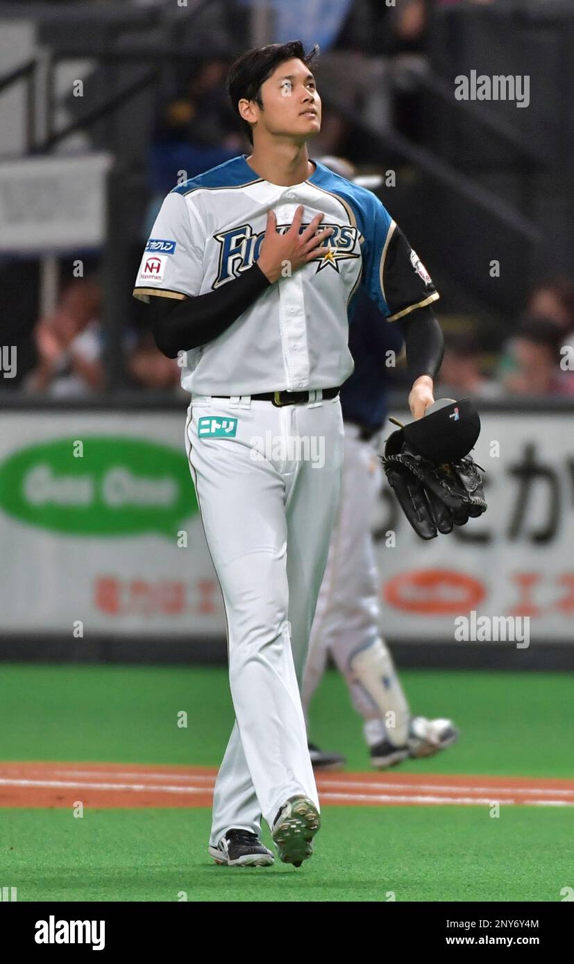 Hokkaido Nippon-Ham Fighters starter Syohei Otani reacts in the 1st inning during a Nippon Professional Baseballs Pacific League match against Orix Buffaloes at Sapporo Dome in Sapporo, Hokkaido on Oct