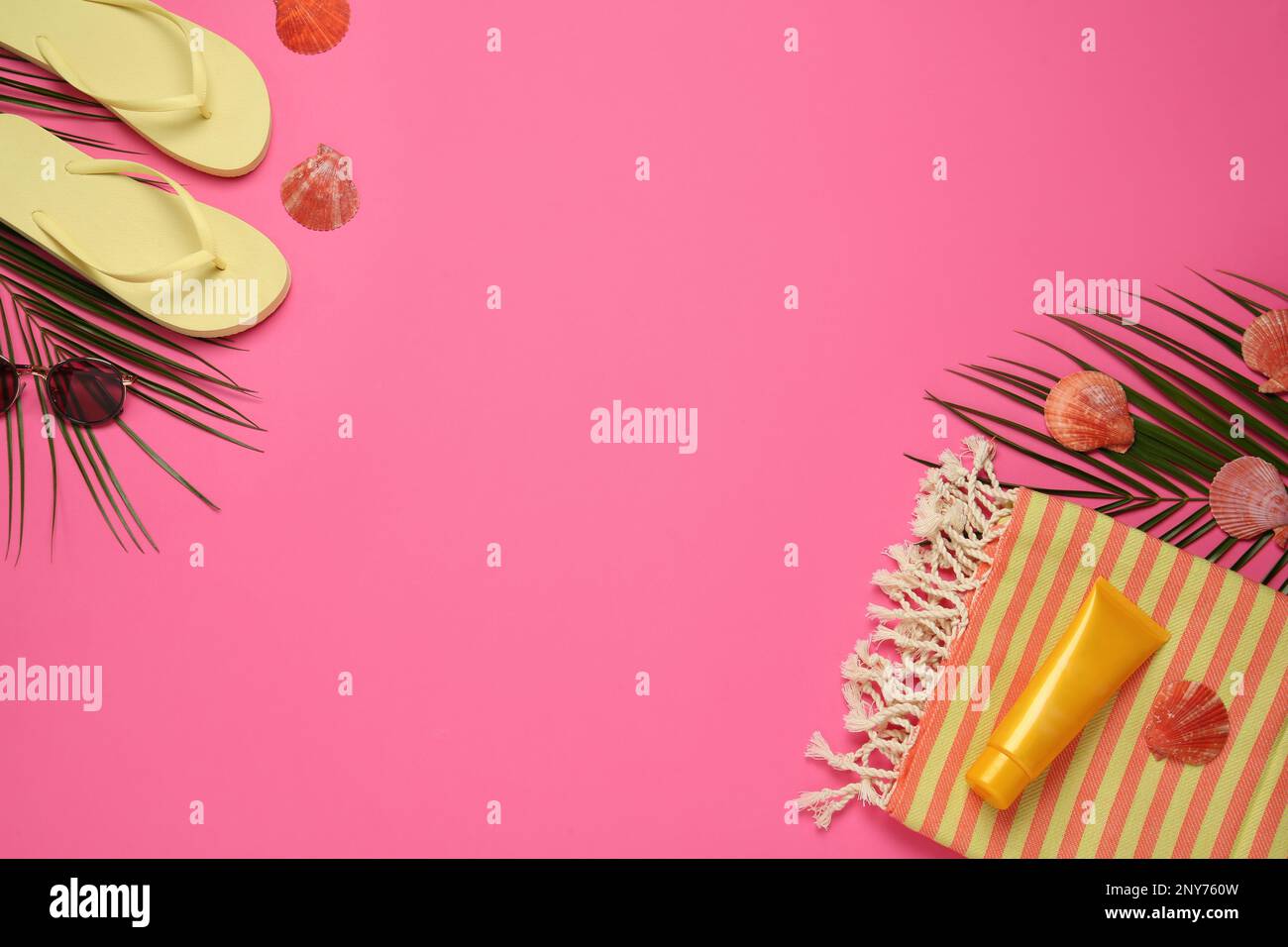 Flat lay composition with different beach objects on pink background, space for text Stock Photo