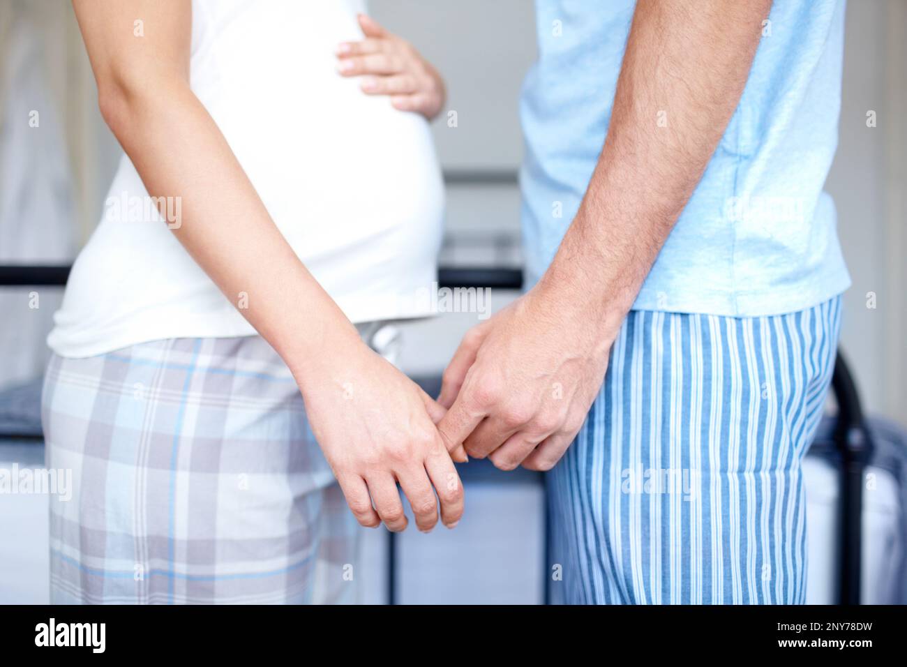 The baby bump that rules this bond. Side view cropped image of a young