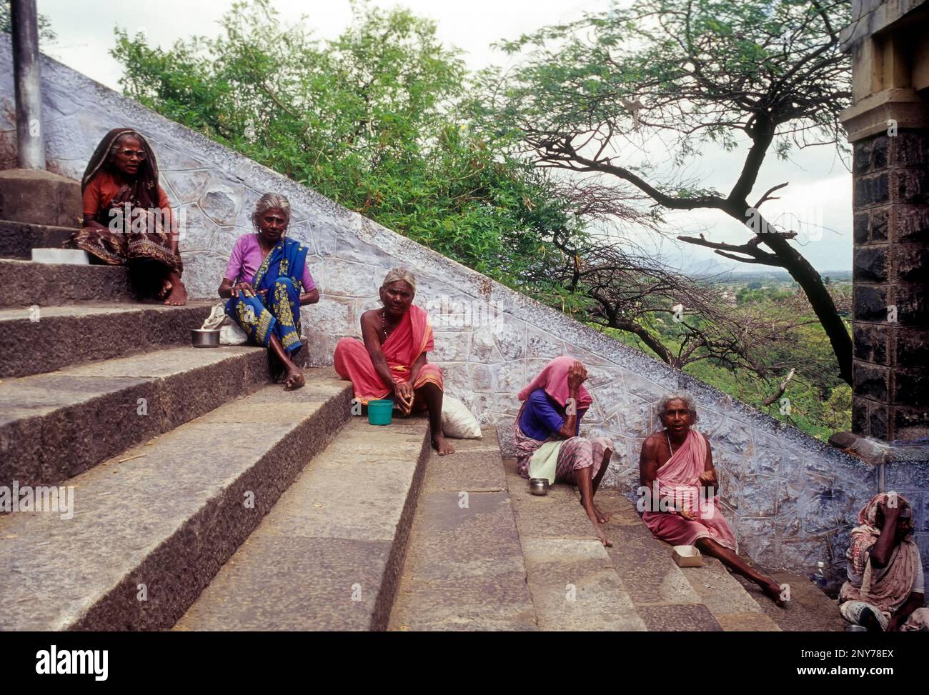 Beggars sitting the steps of Murugan temple in Palani, Tamil Nadu, India Stock Photo