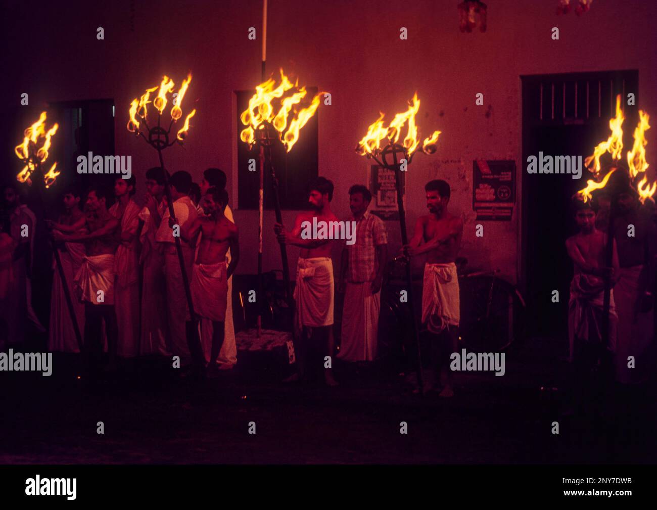 Fire Torch holders Padmanabhaswamy Temple's aarat festival at