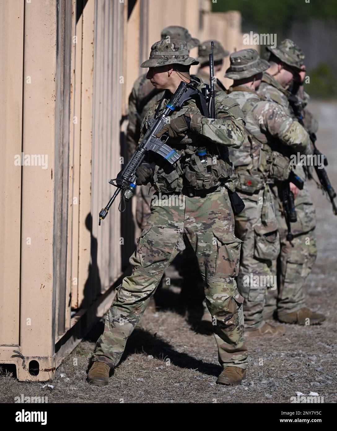 Soldiers assigned to the U.S. Army John F. Kennedy Special Warfare Center and School participate in Basic Urban Combat training during the Tactical Skills portion of the Special Forces Qualification Course (SFQC) at Camp Mackall, North Carolina January 6, 2023. Soldiers participated in SFQC training that tested their knowledge of small unit tactics and basic urban operations to ensure they possess the combat skills required to successfully operate on a Special Forces Operational Detatchment Alpha. Stock Photo