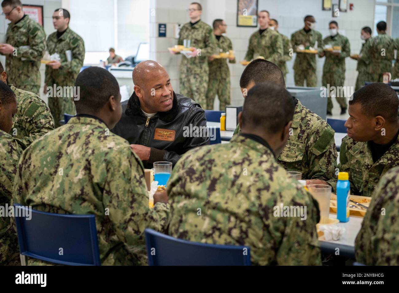 Capt. Kertreck Brooks, commanding officer, eats lunch with recruits at ...