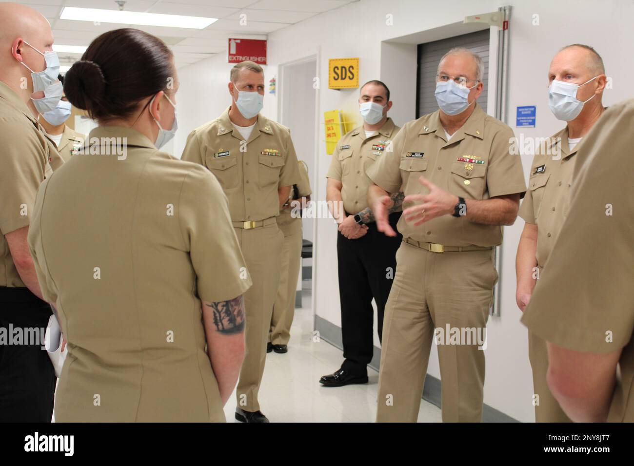 Navy Surgeon General Rear Adm. Bruce Gillingham talks about the future of Navy Medicine with corpsmen at Naval Health Clinic Patuxent River during a visit on Jan. 31, 2021. He is flanked by the clinic’s Commanding Officer Capt. Jeremy Hawker (left) and Director of the Hospital Corps Force Master Chief Michael Roberts (right). Stock Photo