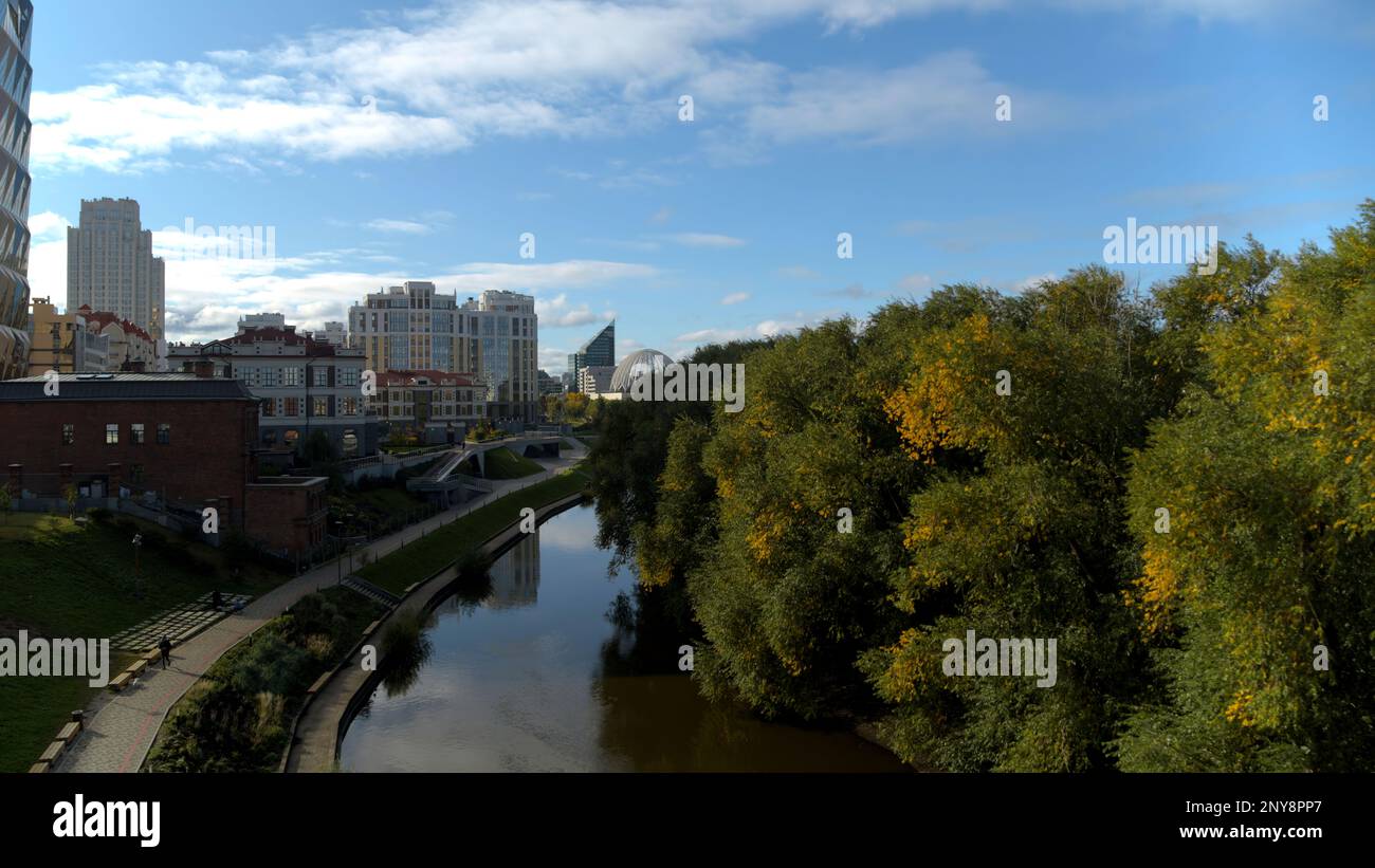 Aerial view of a city summer green park and a flowing river. Stock ...
