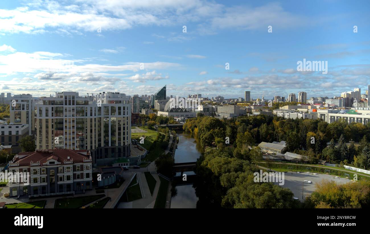 Aerial view of a city summer green park and a flowing river. Stock ...