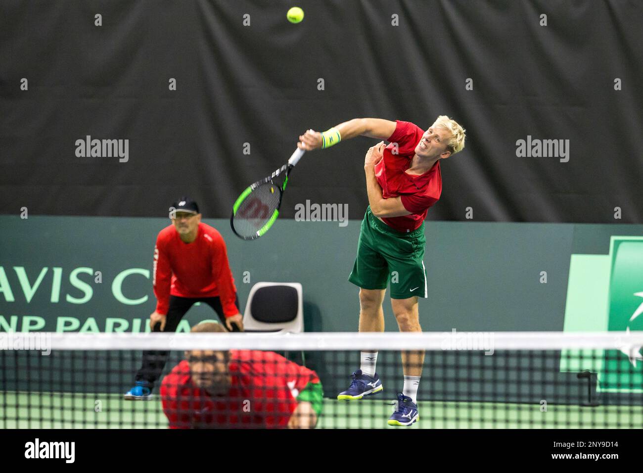 Luca Margaroli, left, and Adrian Bodmer, right, of Switzerland share a word  during their doubles match of the Davis Cup world group playoffs against  Max Mirnyi and Andrei Vasilevski of Belarus in