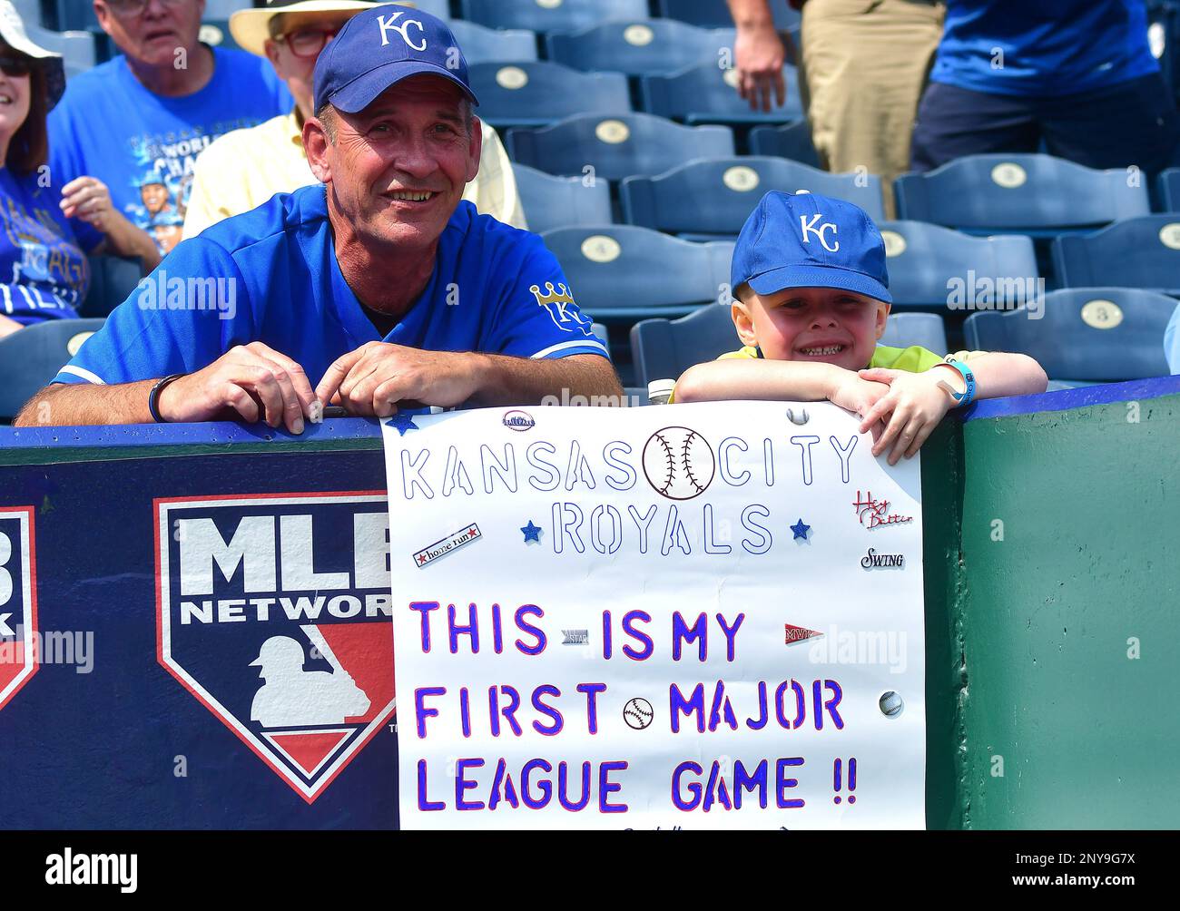 KANSAS CITY, MO - SEPTEMBER 13: A grandfather and grandson as seen before a  Major League baseball game between the Chicago White Sox and the Kansas City  Royals on September 13, 2017