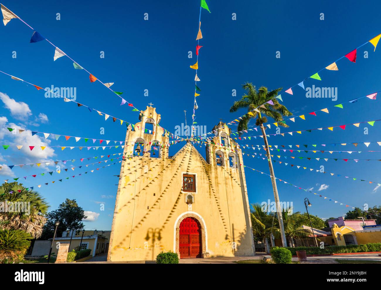 Parroquia de San Antonio de Padua, church decorated with pennants, in Hopelchen, Yucatan Peninsula, Campeche state, Mexico Stock Photo