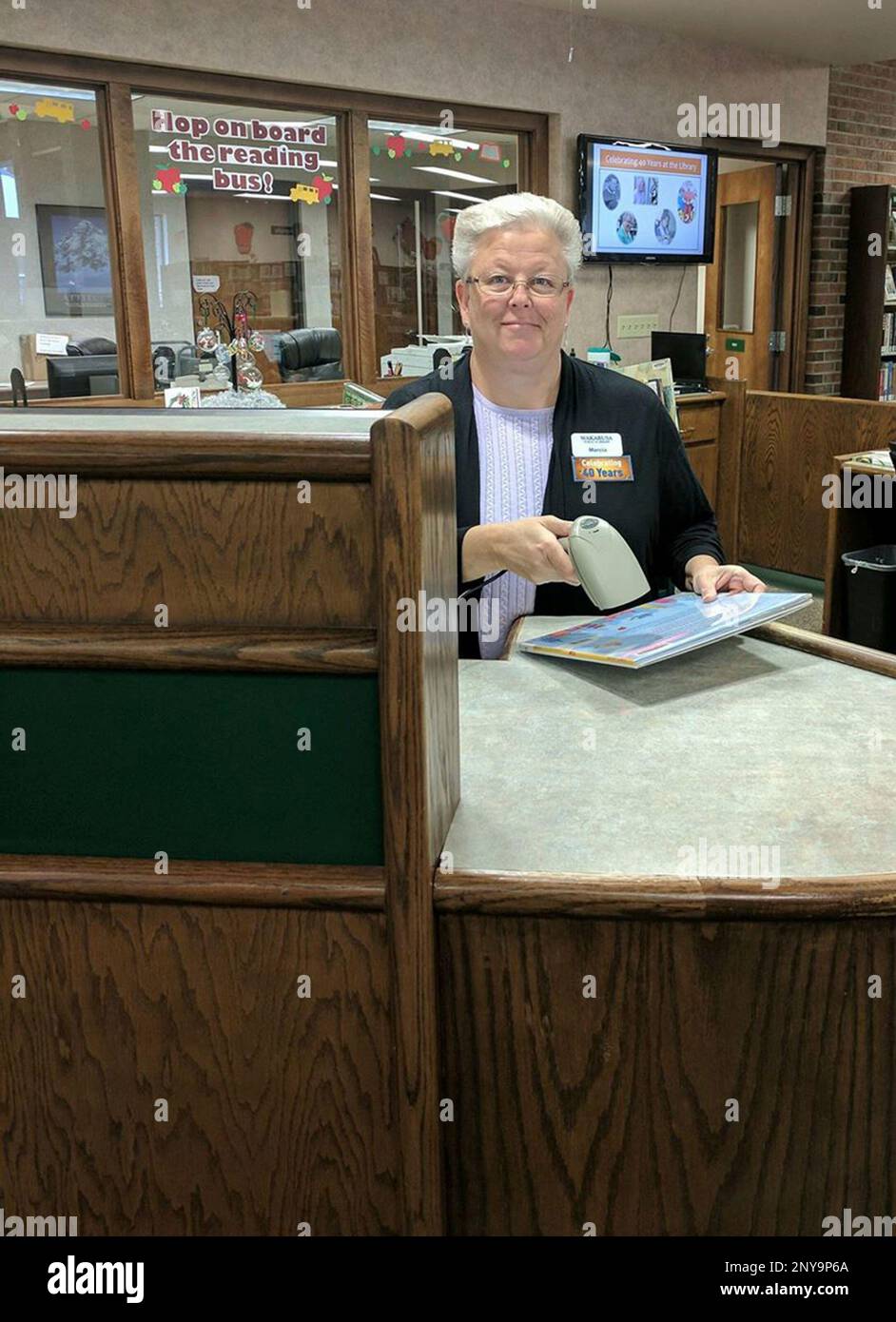 Marcia Parcell poses for a photo at the The Wakarusa Library in The