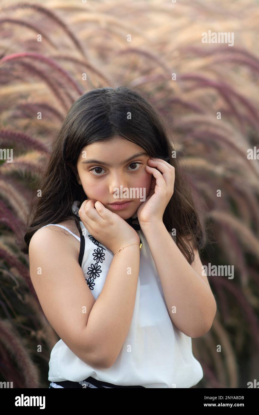 Scared girl hands touching face outdoors Stock Photo Alamy