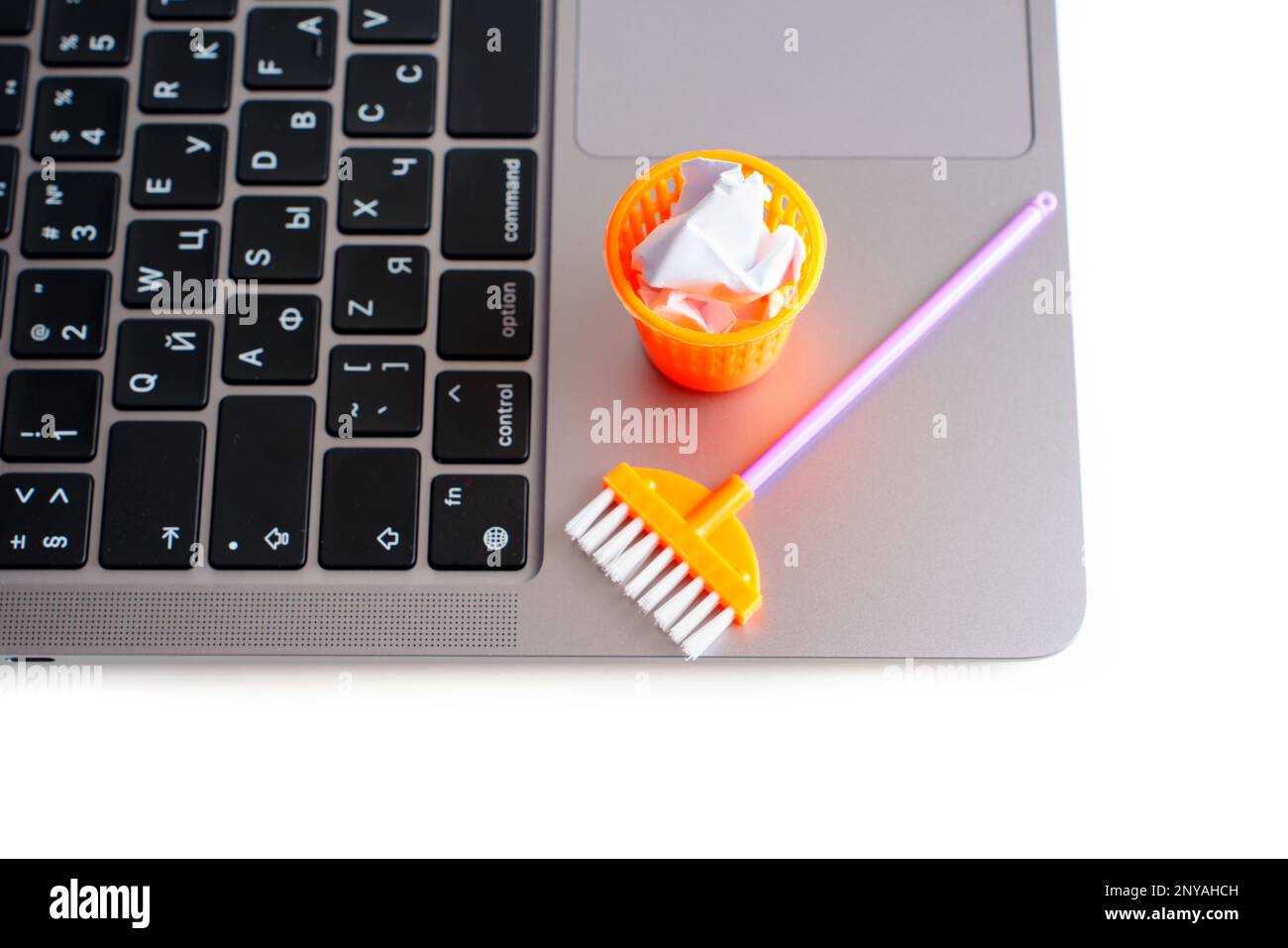 Creative computer dust and debris cleaning concept: Miniature mop and ...