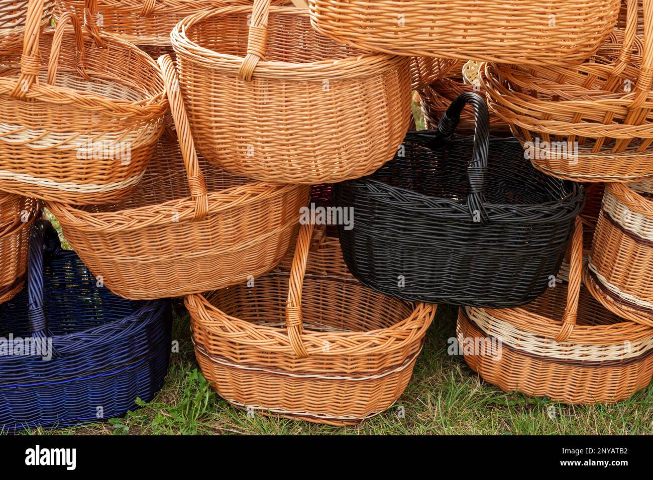 Handmade wicker baskets. Traditional woven containers made by hand from a natural material. Stock Photo