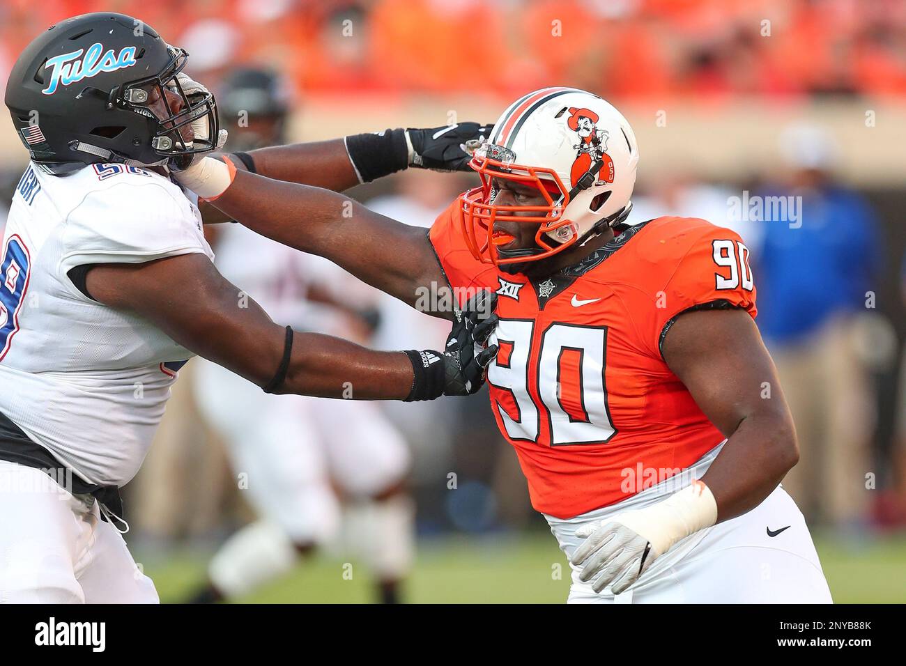 STILLWATER OK AUGUST 31 Oklahoma State Cowboys DT Taaj Bakari (90) during a college football