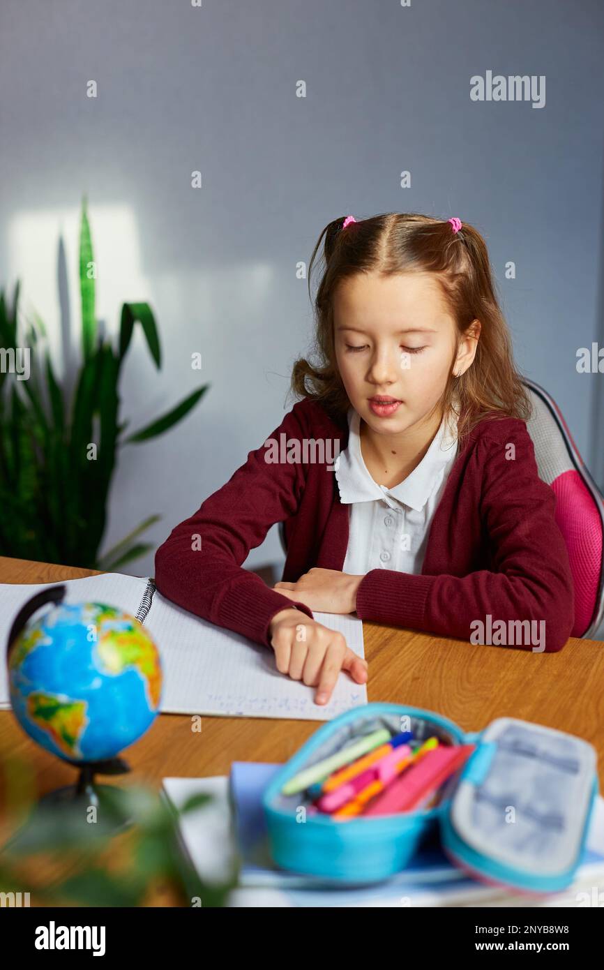 Schoolgirl Sit At Desk Doing Homework Reading Homeschooling Small 