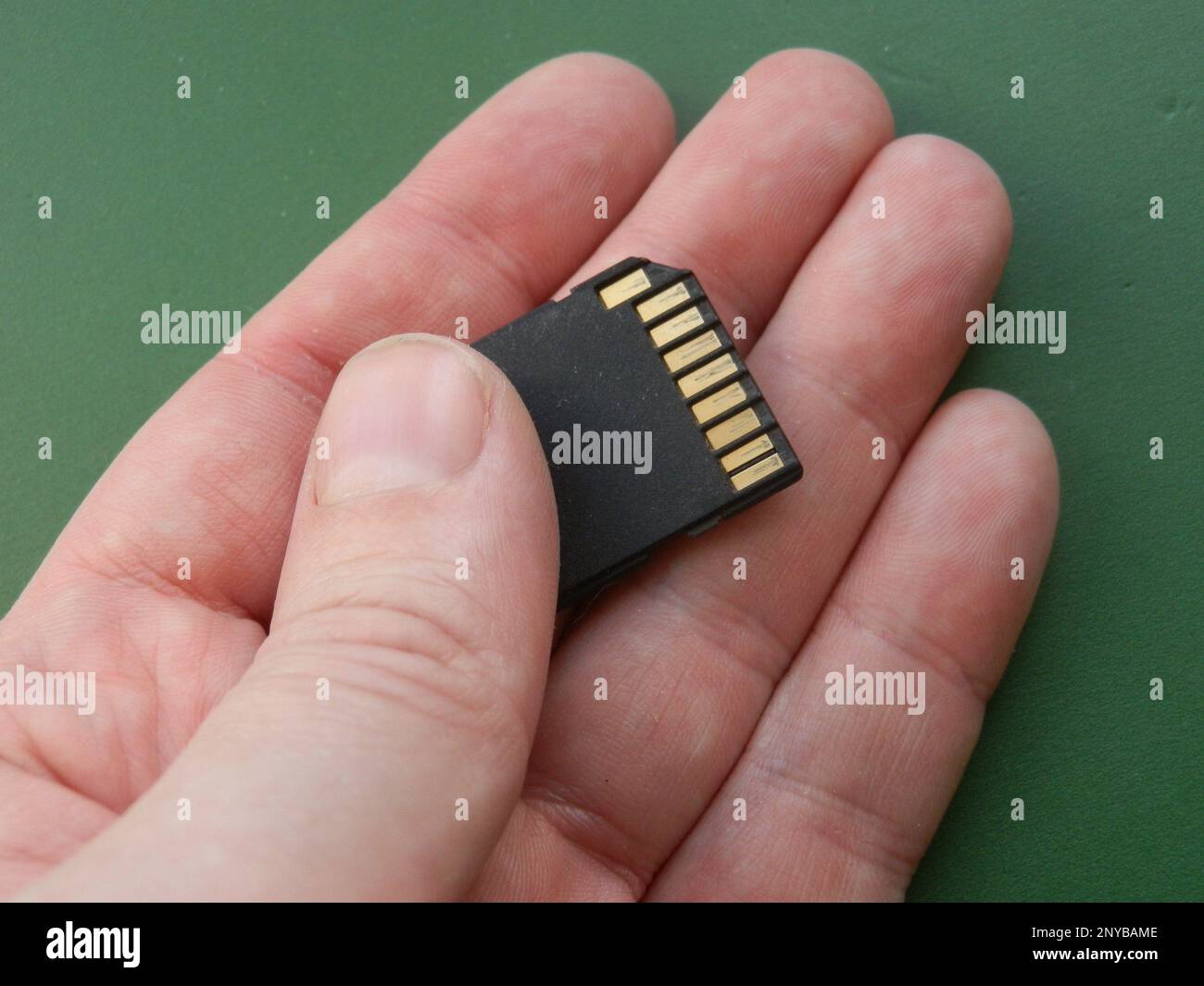 Accessory for smartphone and computer in the hand. Stock Photo