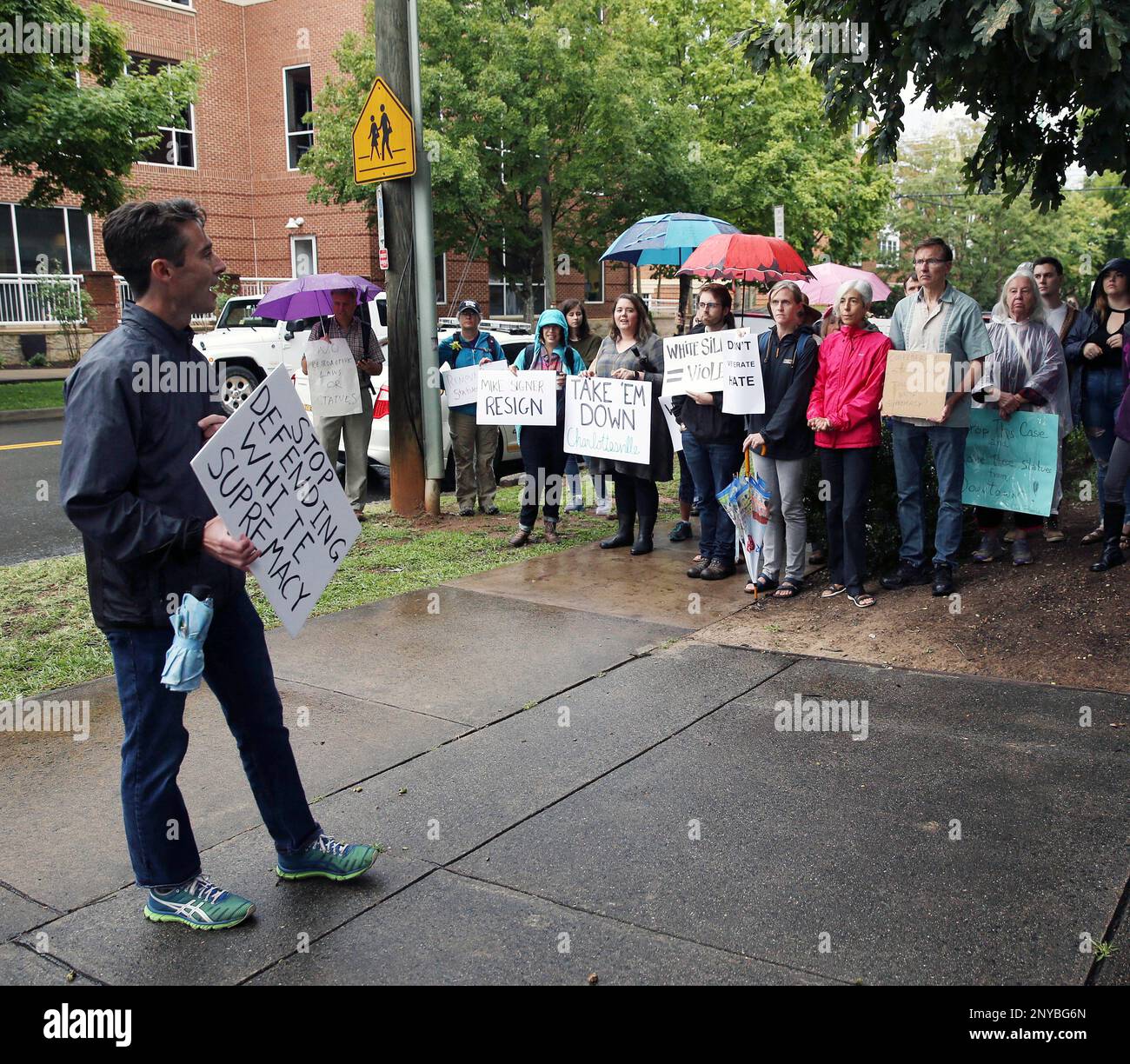 Ben Doherty, left, an organizer with "Showing Up For Racial Justice