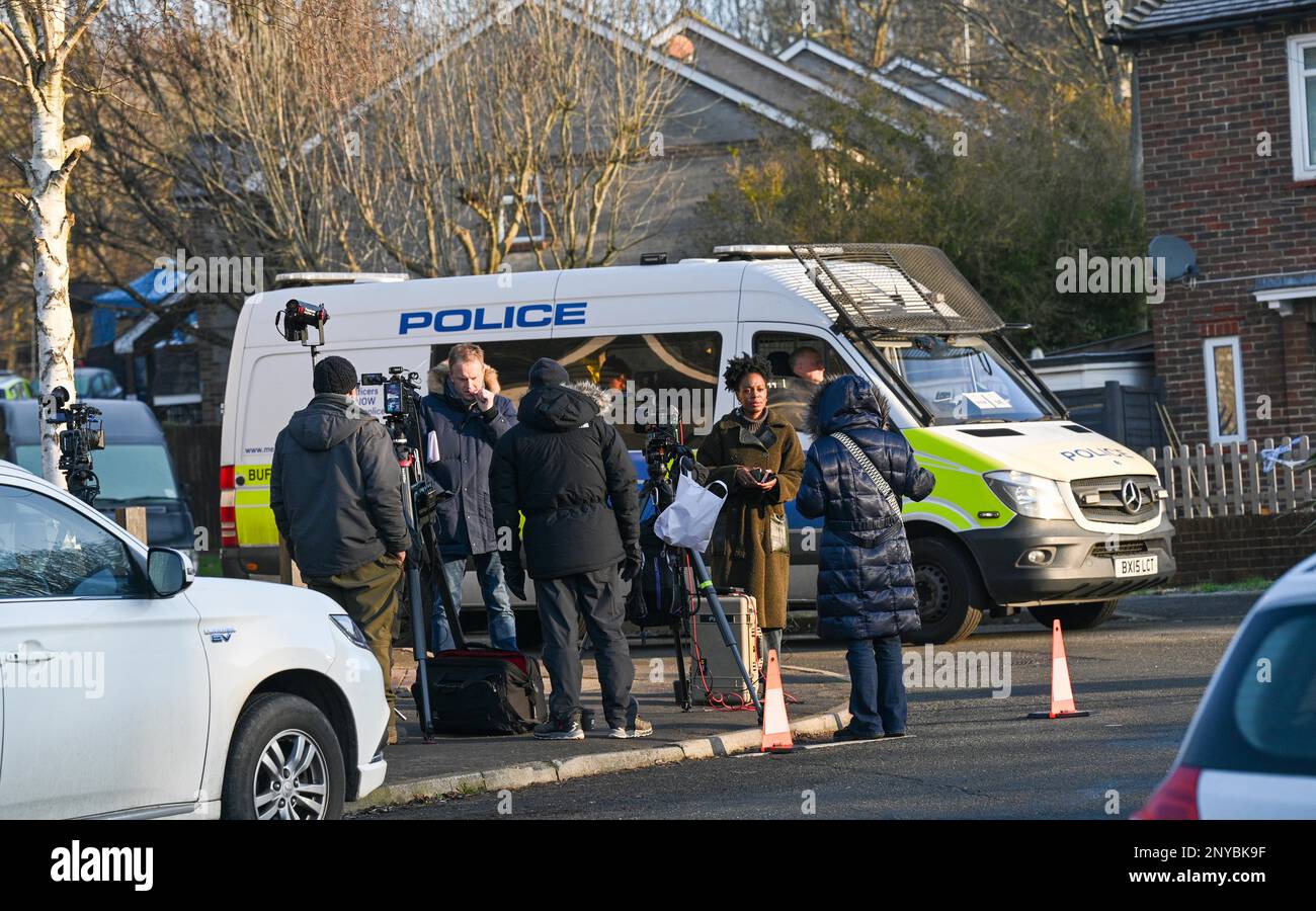 Brighton UK 2nd March 2023 - Police officers and media at the end of Golf Drive in Brighton near to where the remains of a baby have been found in the search for the missing child of Constance Marten and Mark Gordon . A major police search has taken place over the last few days to find the baby after the parents Constance Marten and Mark Gordon were arrested in Brighton earlier in the week : Credit Simon Dack / Alamy Live News Stock Photo