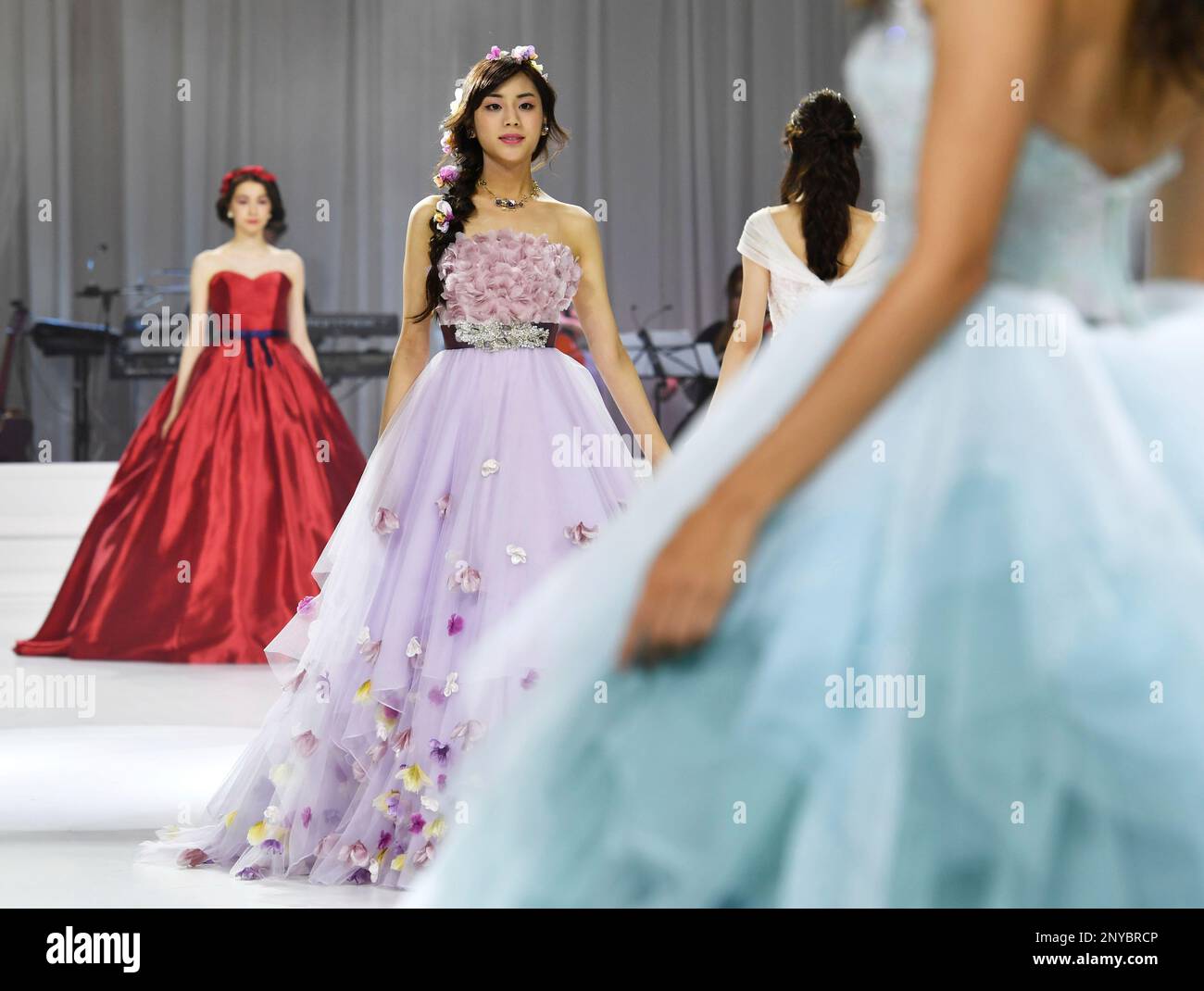 A models present wedding dresses, inspired by Disney Princess Character ...