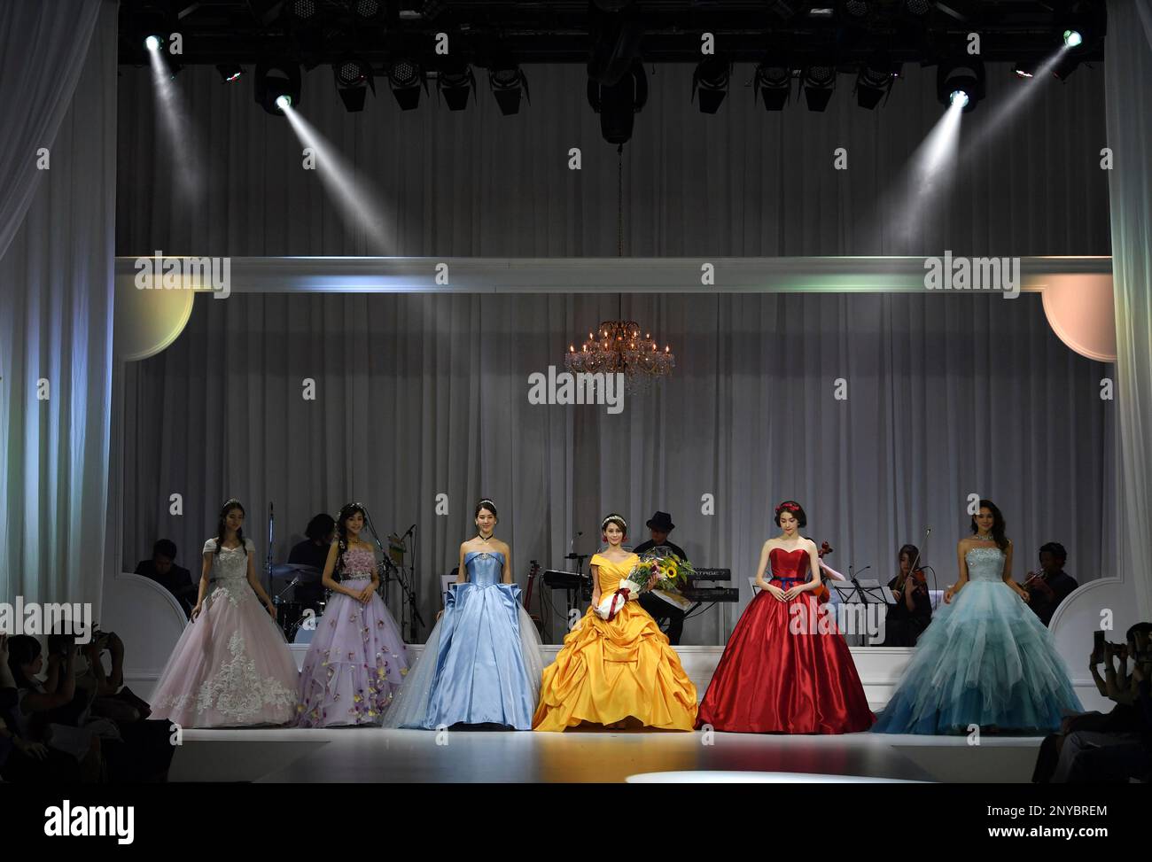 A models present wedding dresses, inspired by Disney Princess Character ...