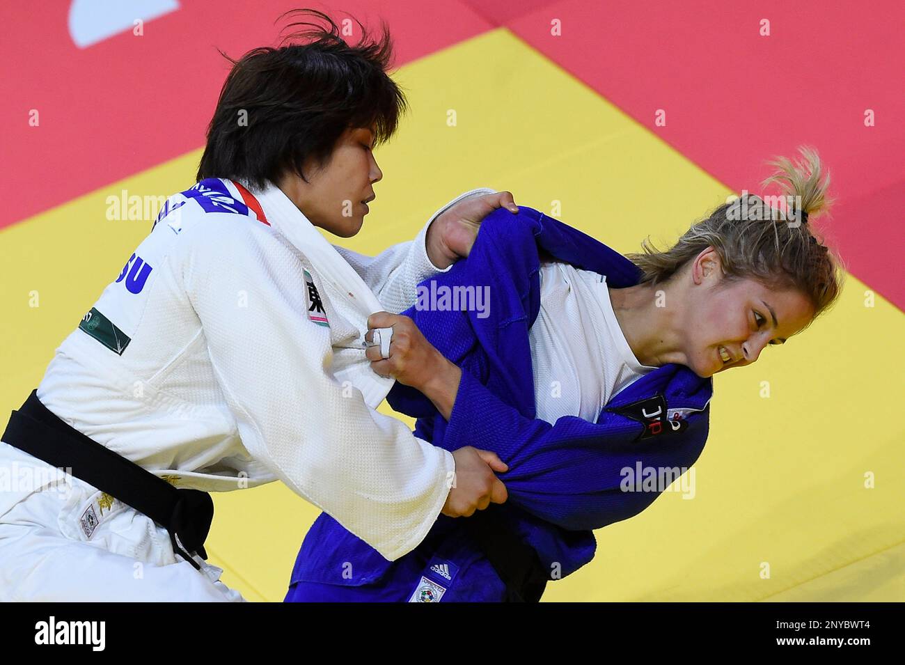 Katinka Szabo, in blue, of Hungary and Ai Shishime of Japan fight in the womens 52kg category of the Judo World Championships in Papp Laszlo Budapest Sports Arena in Budapest, Hungary, Tuesday,