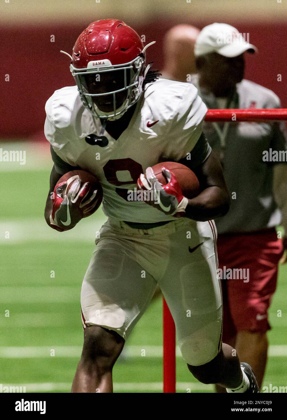 Alabama running back Bo Scarbrough (9) works through drills during