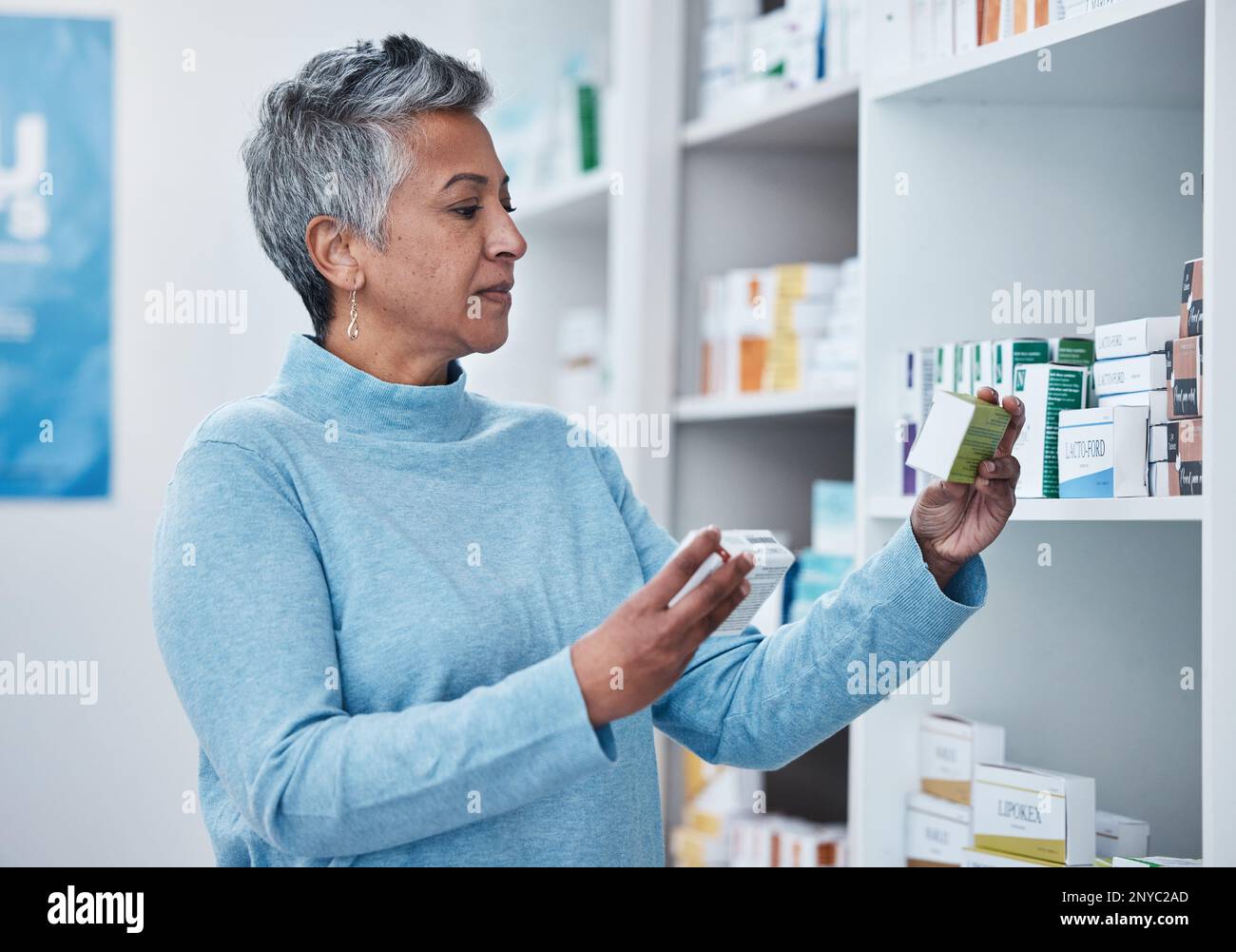 Senior woman, pharmacy and choice with box, medicine and decision with