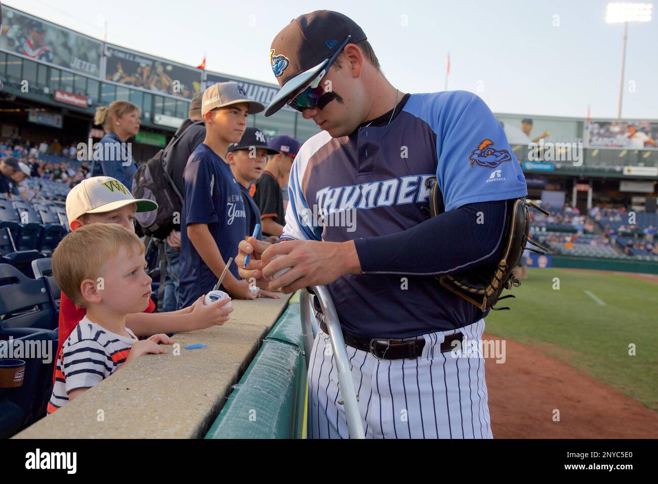 August 26, 2017 - Trenton, New Jersey, U.S - DANTE BICHETTE JR., an  infielder for the Trenton Thunder, signs autographs for kids before the  game vs. the Richmond Flying Squirrels at ARM