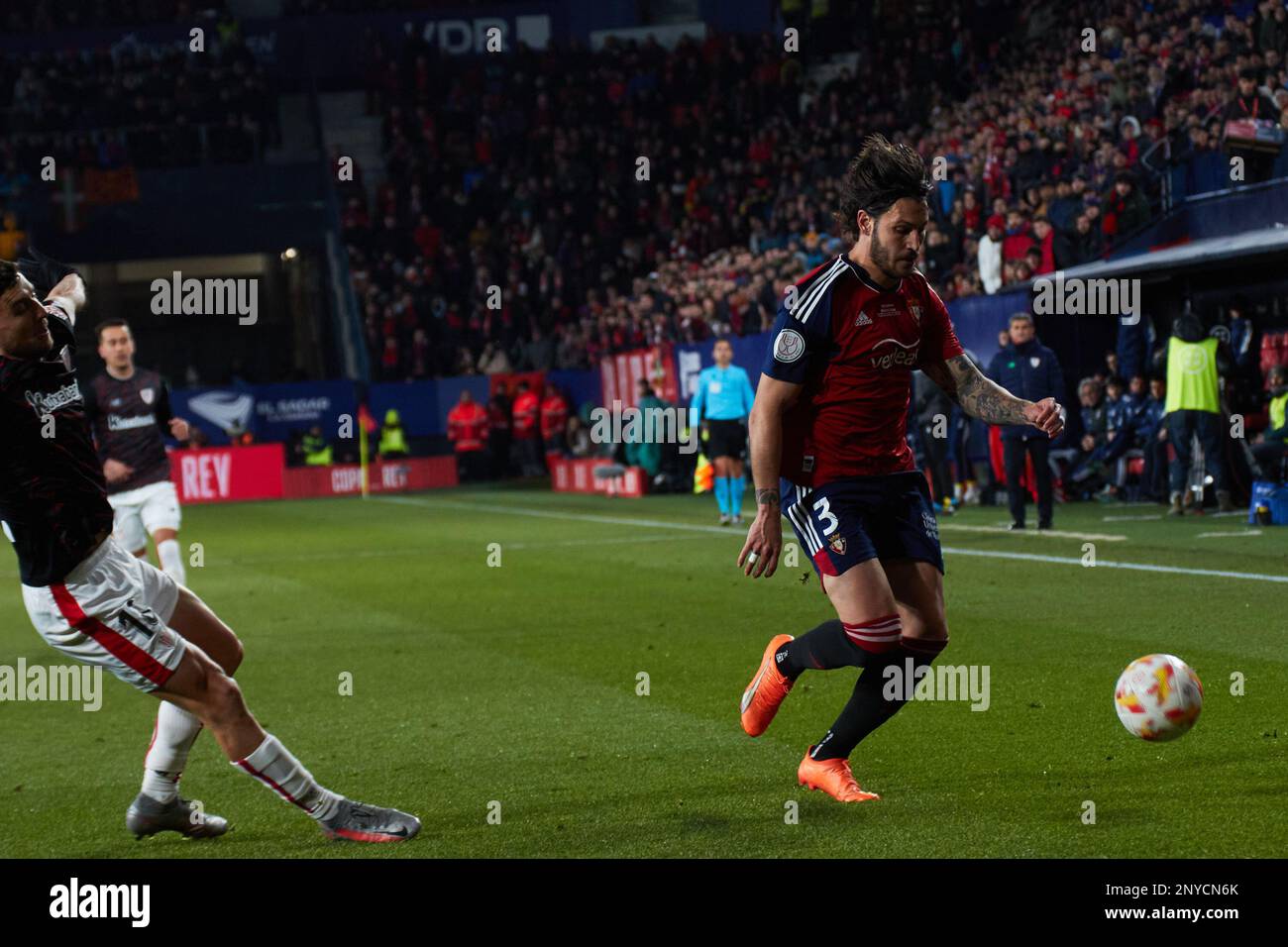 Pamplona, Spain. 1st Mar. 2023. Sports. Football/Soccer. De Marcos (18. Athletic Club) and Juan Cruz (3. CA Osasuna) during the first leg football match of the semifinal of the Copa del Rey between CA Osasuna and Athletic Club played at El Sadar stadium in Pamplona (Spain) on March 1, 2023. Credit: Iñigo Alzugaray/Alamy Live News Stock Photo