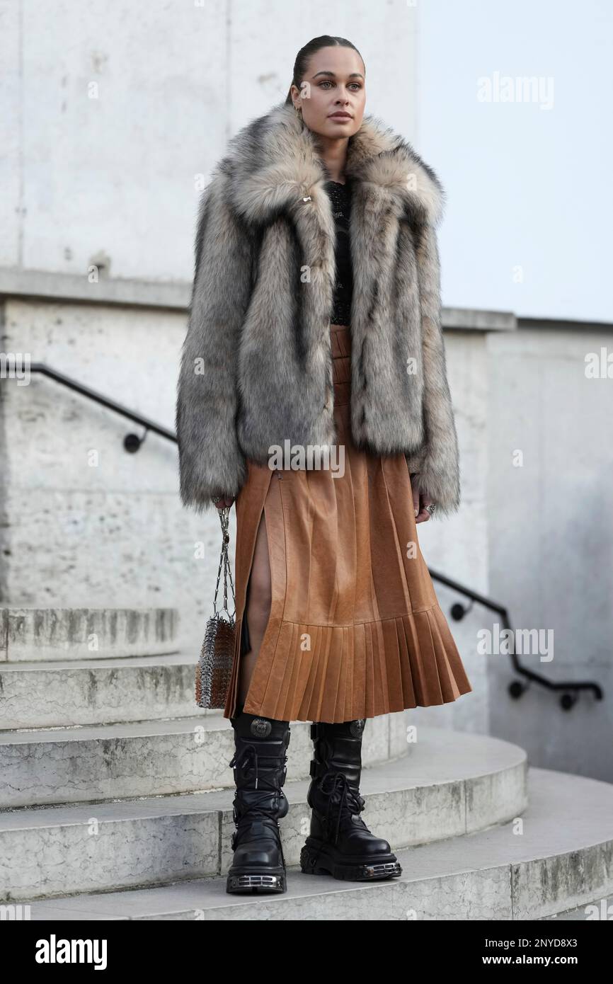 Sarah Lysander poses for photographers upon arrival at the Paco Rabanne