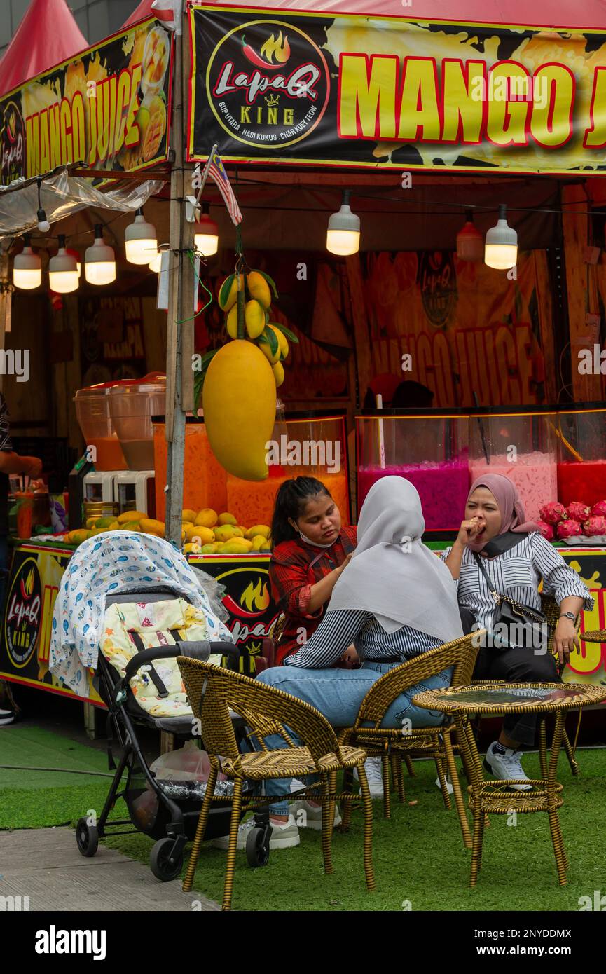 A street vendor selling fruit juices on Bukit Bintang, Kuala Lumpur