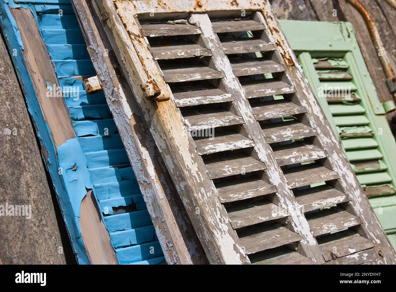 Old wooden shutters with peeling paint, vintage Stock Photo - Alamy