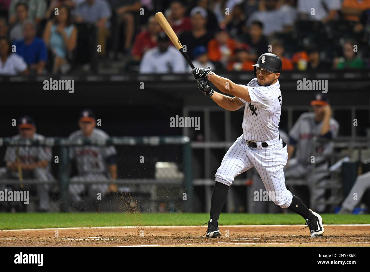 Chicago White Sox third baseman Yoan Moncada (10) swings at the pitch in an  MLB baseball game against the Colorado Rockies, Sunday, Aug. 20, 2023. The  White Sox defeated the Rockies 10-5