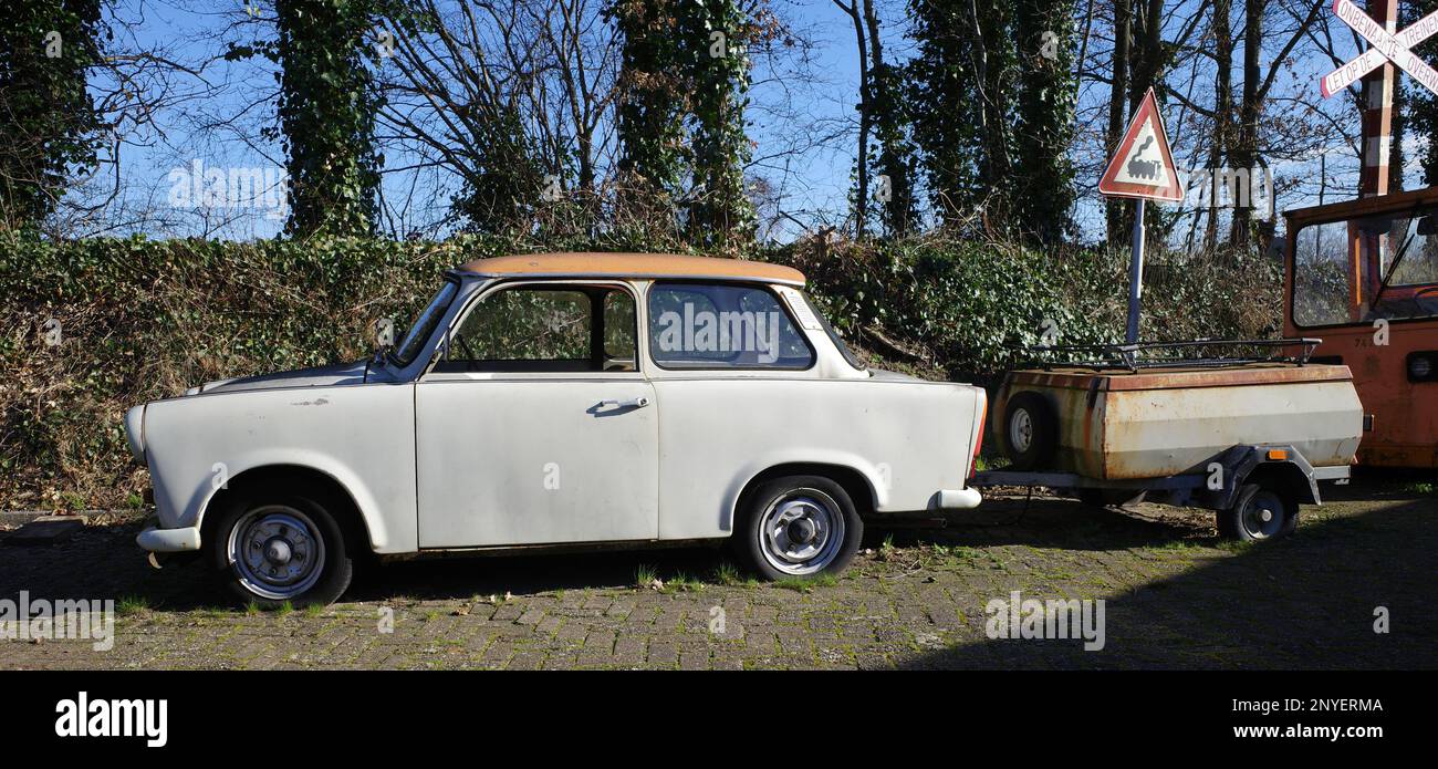 Lieren, Netherlands Feb 28 2023 An old Trabant 601 with a small trailer. This car was build in the DDR from 1964 to 1990. Stock Photo