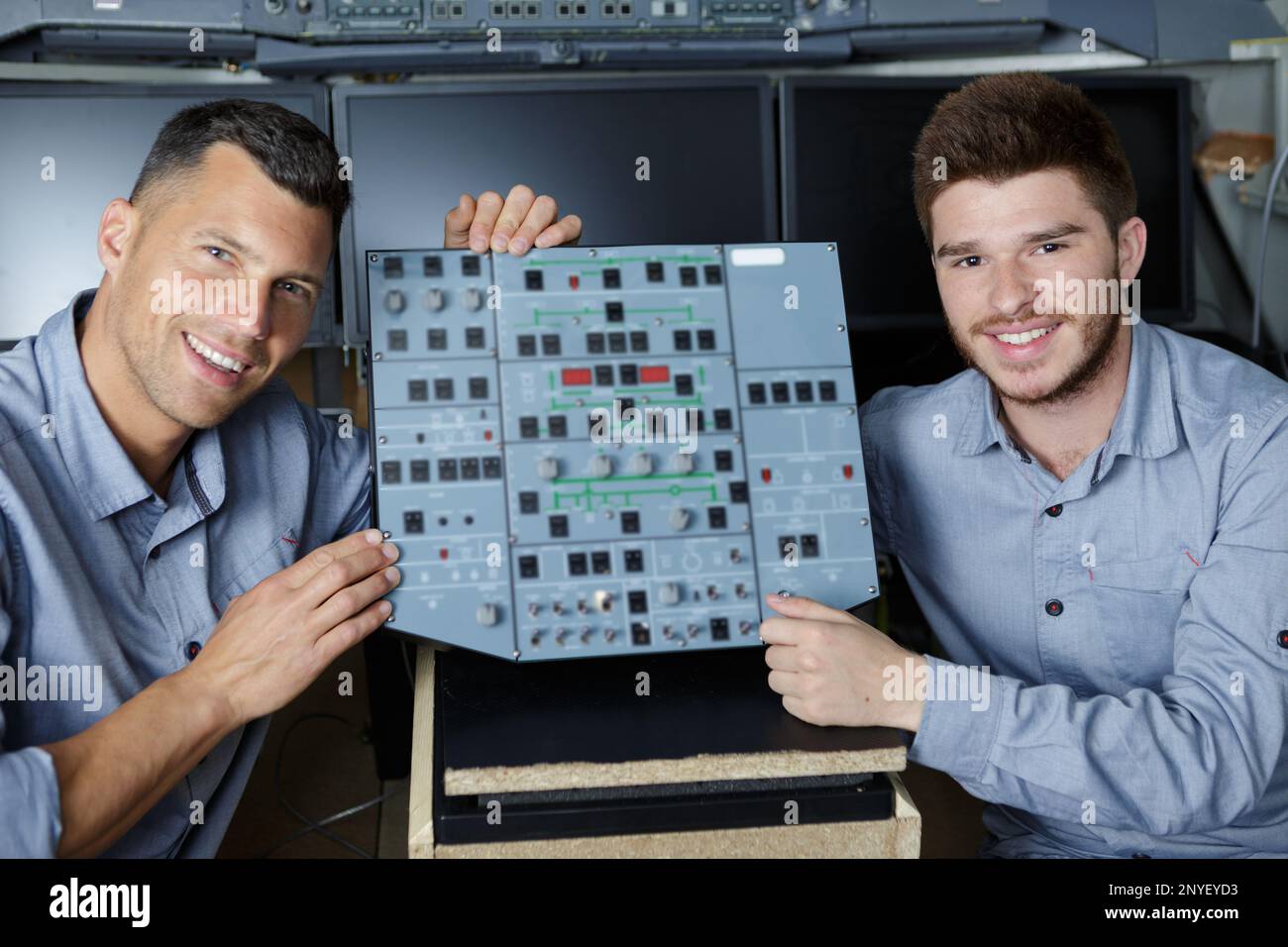 Two Engineer Computer two engineers working with electronics components Stock Photo - Alamy
