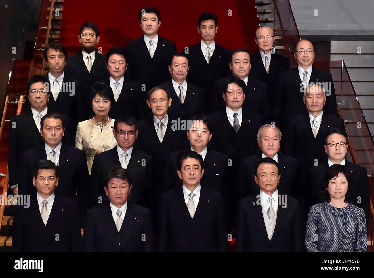 Japan's Prime Minister Shinzo Abe (front, C) and his new Cabinet ...